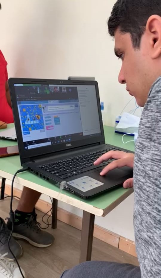 A student plays a game on a computer